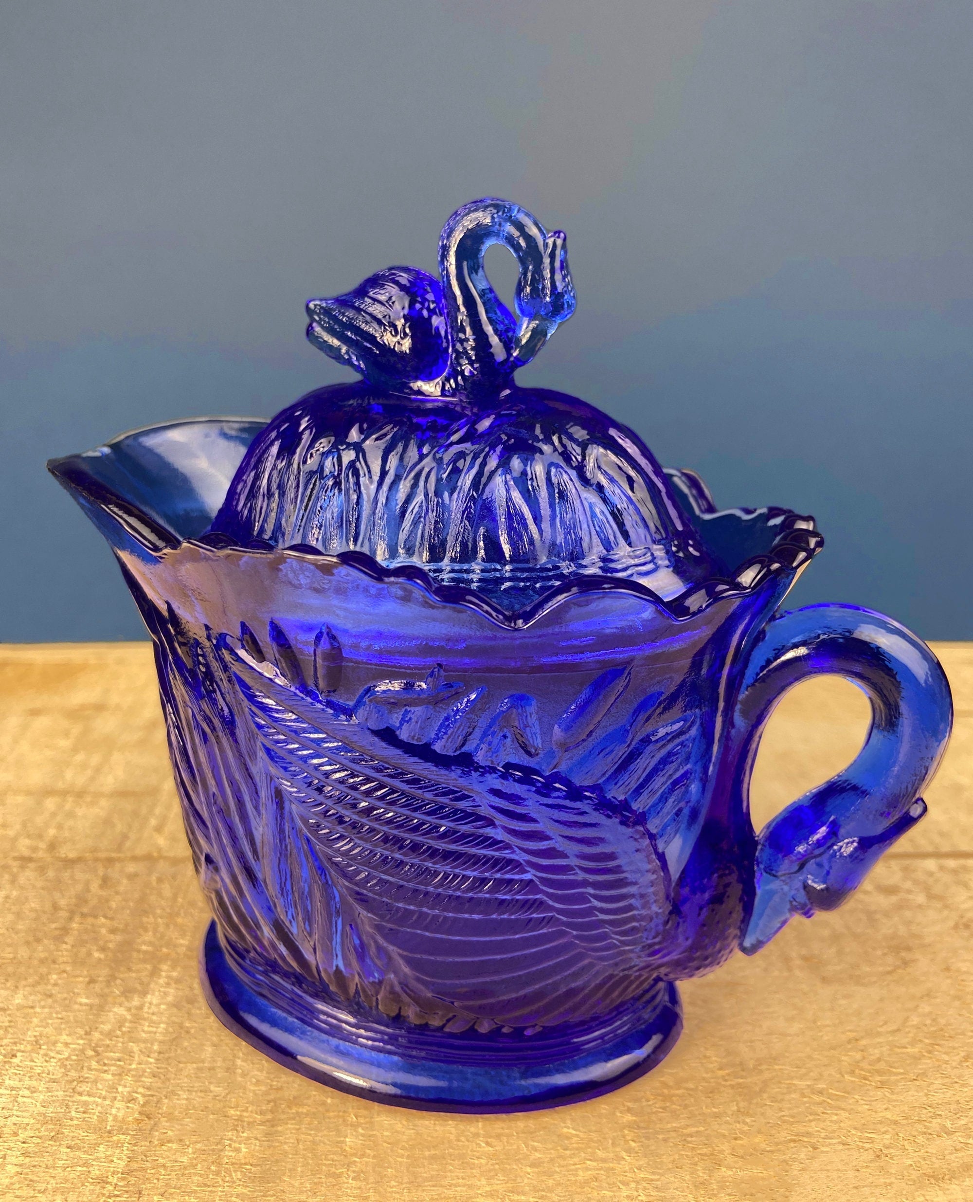 Cobalt Blue Glass Creamer with Swan Handle & Embossed Reed Design