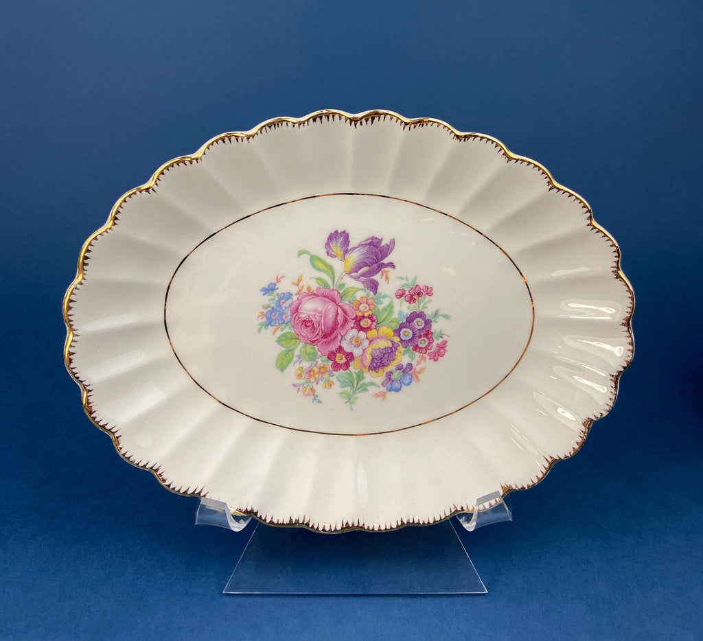 Vintage Dish Set. Leigh Wake by Leigh Potters. Set of 4 Placements: Dinner, Salad Plates, Soup, Salad Bowls, One Serving Dish & Teacups.
