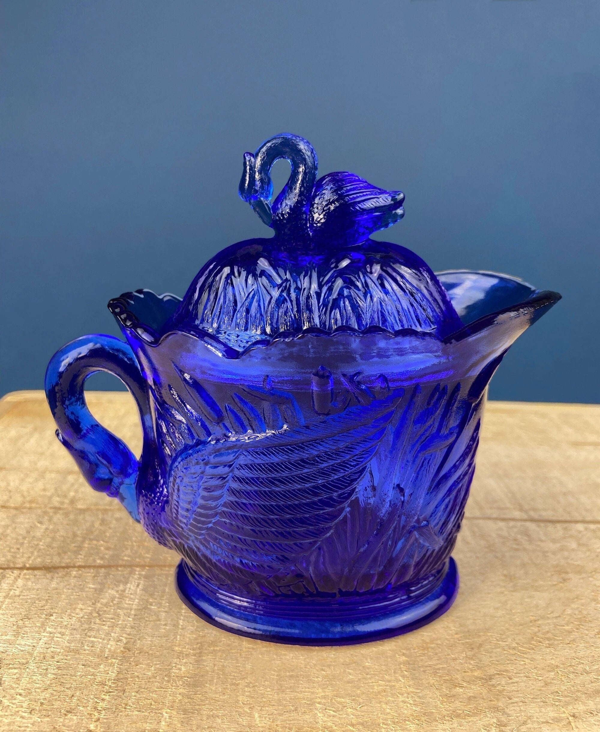 Cobalt Blue Glass Creamer with Swan Handle & Embossed Reed Design